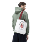 'We Carry The Flame' Tote Bag